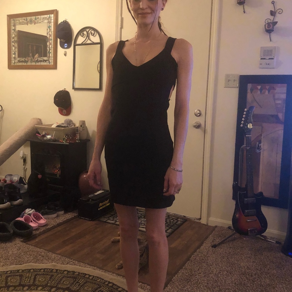 Black, semi-open back dress by Decibel